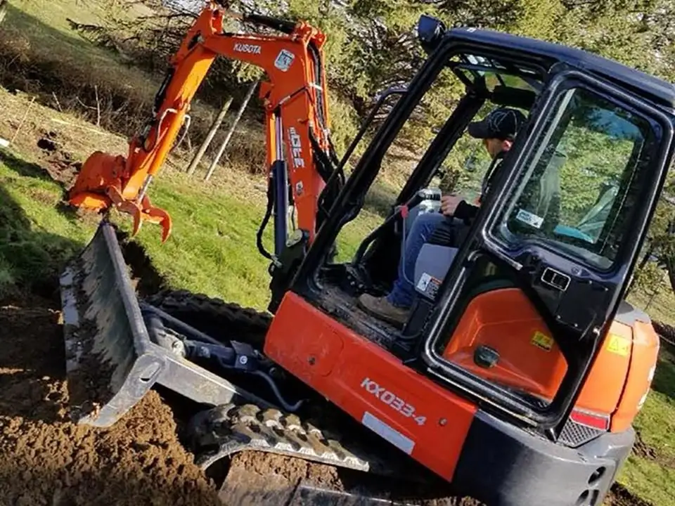 Kubota KX033 mini excavator featured by LS Fencing.